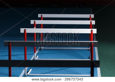 Row Of Hurdles For Sprint Training On The Lane