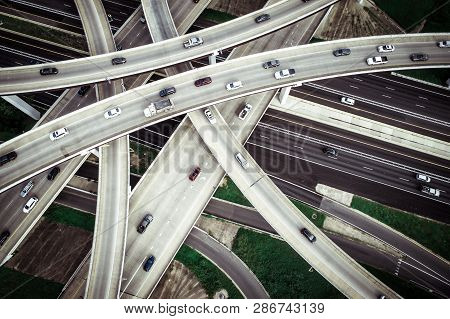 Straight Down Drone Angle Above Curved Highways Elevated Roadways Stacked One On Top Of Another , Ur