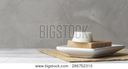 Solid Shampoo And Conditioner Bars In Soap Dish