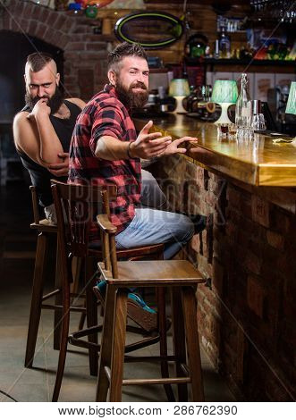 Hipster Brutal Bearded Man Spend Leisure With Friend At Bar Counter. Men Relaxing At Bar. Friday Rel