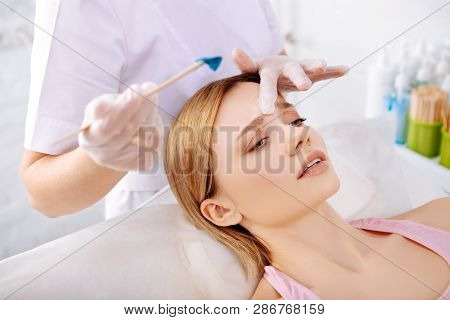 Woman Feeling Pain Depilating Line Between Eyebrows