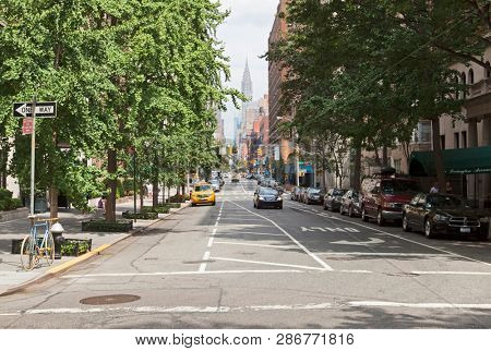 New York, USA; circ Aug 2012: Street view of New York City and Chrysler Building in the summer