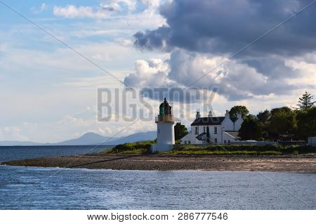 Corran Lighthouse Watches Loch Linnhe Under Dramatic Sky, Near Fort William, In Scottish Highlands
