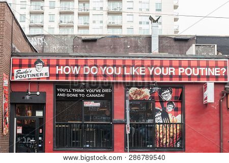 Ottawa, Canada - November 11, 2018: Smoke S Poutinerie Logo On Their Restaurant For Ottawa, Ontario.