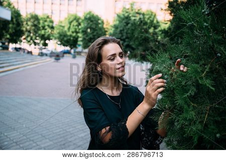 Beautiful Young Girl In The Park On A Summer Evening.