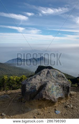Beautiful Scenery On The Summit Of Mount Gede Pangrango With Stones Crossed By Vandalism