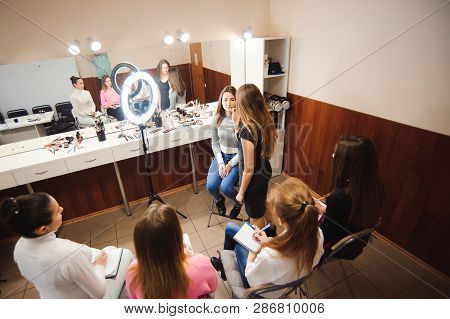 Professional Makeup Teacher Training Her Student Girl To Become Makeup Artist. Makeup Tutorial Lesso