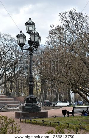 Cast Iron Lamp In The Catherine Garden In Early Spring In Saint-petersburg, Russia