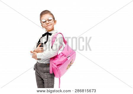 Back To School. Beautiful Little Girl Dressed Like A School Girl - White Shirt And Gray Pants, Round
