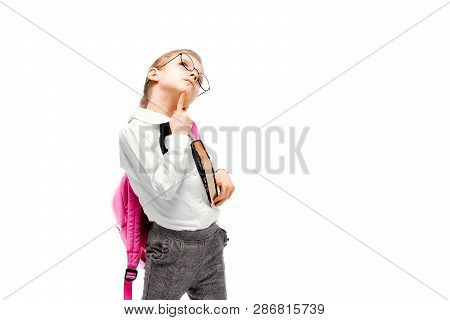 Back To School. Thoughtful Beautiful Little Girl Dressed Like A School Girl - In White Shirt And Gra