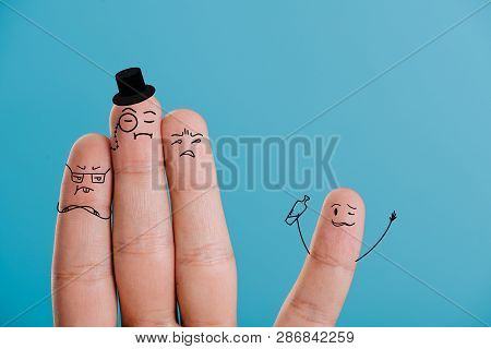 Cropped View Of Fingers As Snobs Looking At Drunk Man Isolated On Blue