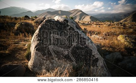 Rock Painting Aka Petroglypgs At The Field , Cholpon-ata, Issyk-kul, Kyrgyzstan