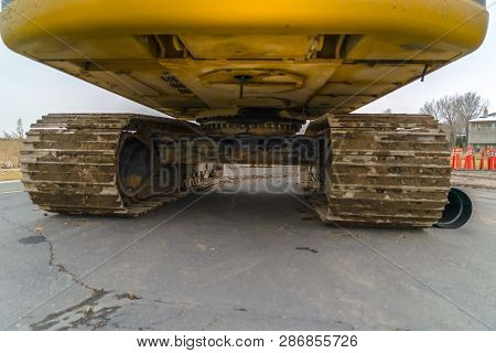 Bottom Of An Excavator With Soil On Grouser Pad