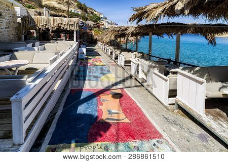 Matala, Crete - September 24: Crystal Clear Sea Amd Boat At Matala Beach On September 24, 2017 In Ma