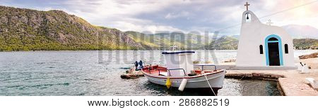 Beautiful Boat On The Lake Vouliagmeni. Picturesque Places Of Greece