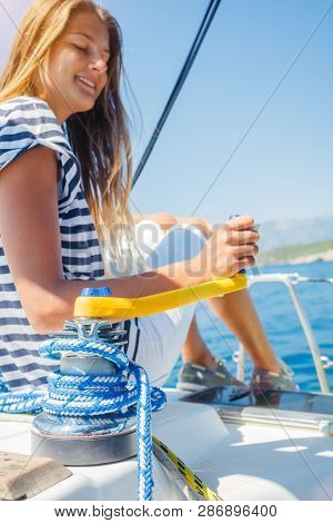 Girl On Board Of Sailing Yacht On Summer Cruise. Travel Adventure, Yachting With Child On Family Vac