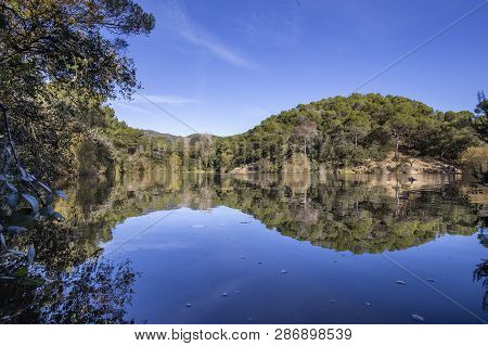 Small Lake With Reflection In Terrassa, Barcelona, Spain