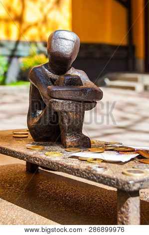 Stockholm, Sweden - May 26, 2017: Jarnpojke Or Iron Boy Known As The Little Boy Who Looks At The Moo