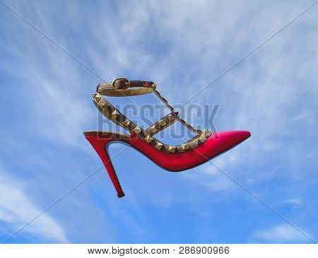 Pink Beautiful Shoe Floating In The Sky, Dreaming Of Being Beutiful At The Party.