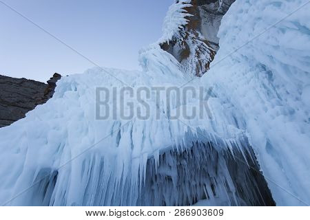 Large Icicles. Winter Frozen Nature