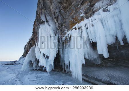 Large Icicles. Winter Frozen Nature