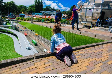 Netherlands. Den Haag. Miniature Park Madurodam.july 2016. Selective Focus.girl Look Down On The Min