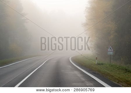 Driving On Countryside Road In Fog. Illustration Of Dangers Of D