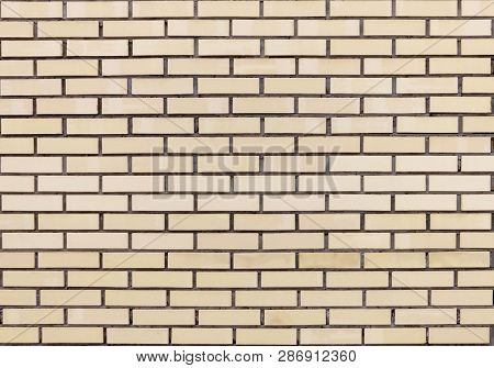 The Texture Of The Wall Of Yellow Kerpicha. Brick Wall. Yellow Brick. Seamless Wall Texture. Seamles