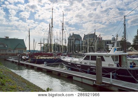 Rotterdam, The Netherlands, October 6, 2018: View Of Ships And Boats Docked In Veerhaven Port In Cen
