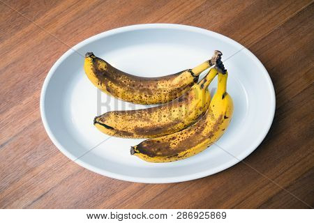 Top View Of Brown Spotted Bananas. Banana With Dark Black Spots