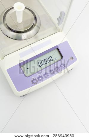 Laboratory Scale On Table In White Background