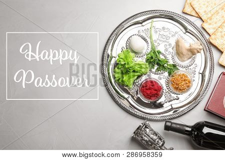 Flat Lay Composition Of Symbolic Pesach Items On Color Background. Happy Passover