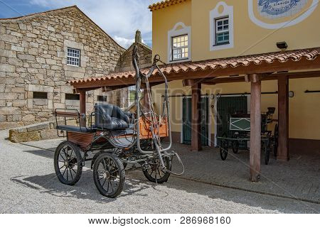 Almeida, Guarda, Portugal; May 2013: Typical Old Horse-drawn Carriages In Picadeiro Del´rey In The W