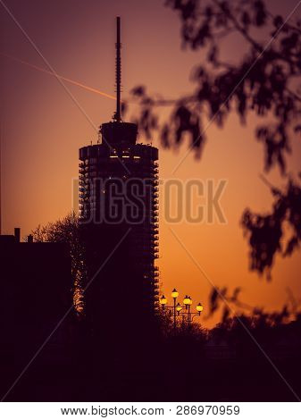Image Of Big Tower With Street Lamps During Sunset In Augsburg, Bavaria, Germany
