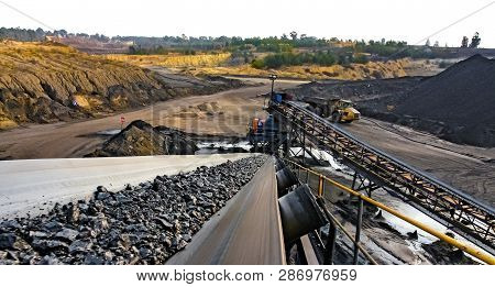 Coal Ore On A Conveyor Belt For Processing