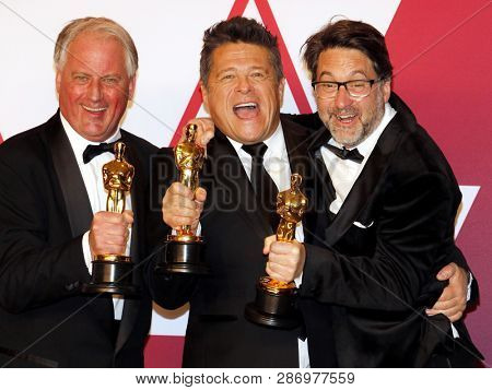 Paul Massey, Tim Cavagin and John Casali at the 91st Annual Academy Awards - Press Room held at the Loews Hotel in Hollywood, USA on February 24, 2019.