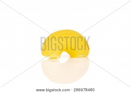 One Whole Raw Pasta Pipe Rigate Variety Like A Rainbow Isolated On White Background