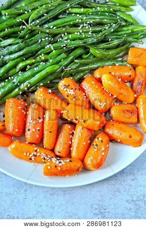 Healthy Food On A Plate. Green String Beans And Baby Carrots, Cooked On The Grill. Vegan Lunch. Usef