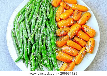 Healthy Food On A Plate. Green String Beans And Baby Carrots, Cooked On The Grill. Vegan Lunch. Usef