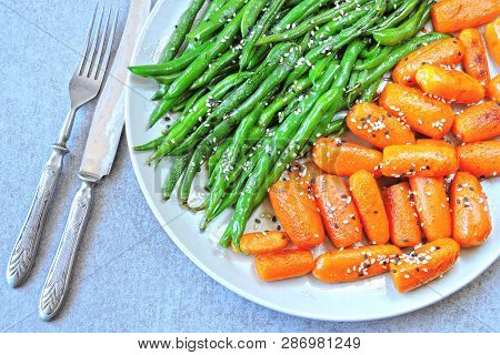 Healthy Food On A Plate. Green String Beans And Baby Carrots, Cooked On The Grill. Vegan Lunch. Usef