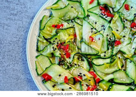 Cucumber Salad In Chinese Style. Salad With Cucumbers And Chili Pepper. Chinese Salad With Cucumber.