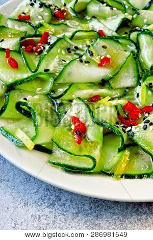 Cucumber Salad In Chinese Style. Salad With Cucumbers And Chili Pepper. Chinese Salad With Cucumber.