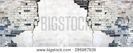 Detail of Wall Stucco plaster falling apart old crumbling bricks crumble