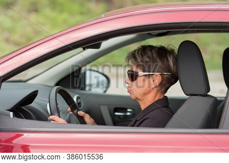 Fashion Business Senior Woman Driving Red Car