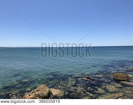 View Of The Ocean From The Beach Of Costa Da Caparica, Portugal
