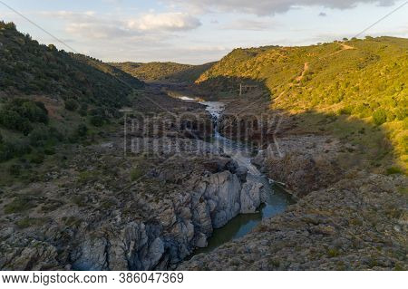 Pulo Do Lobo Waterfall Drone Aerial View With River Guadiana And Beautiful Green Valley Landscape At