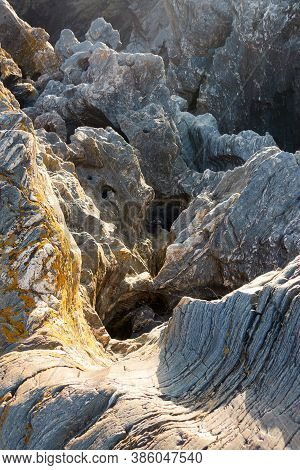 Natural Pond With Green And Red Water Plants On The Middle Of Beautiful Detailed Rocks In Pulo Do Lo