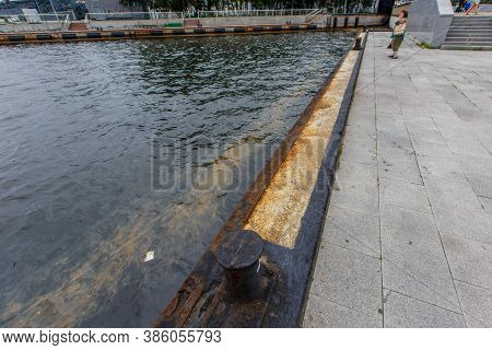 Ecological Catastrophy. Close-up. Spill Of Oil Products Into The Sea.