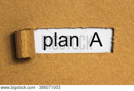 The Text Plan -a Behind Torn Brown Paper