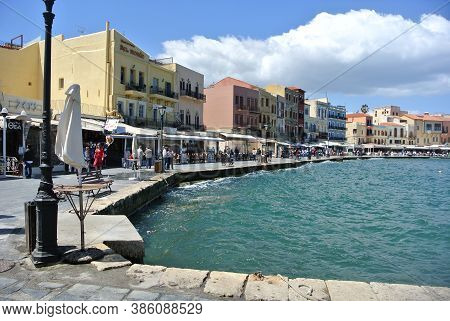 Chania, Crete / Greece / April 26 2016 : The Greek Island Of Crete. View Of The Beautiful Harbor At 